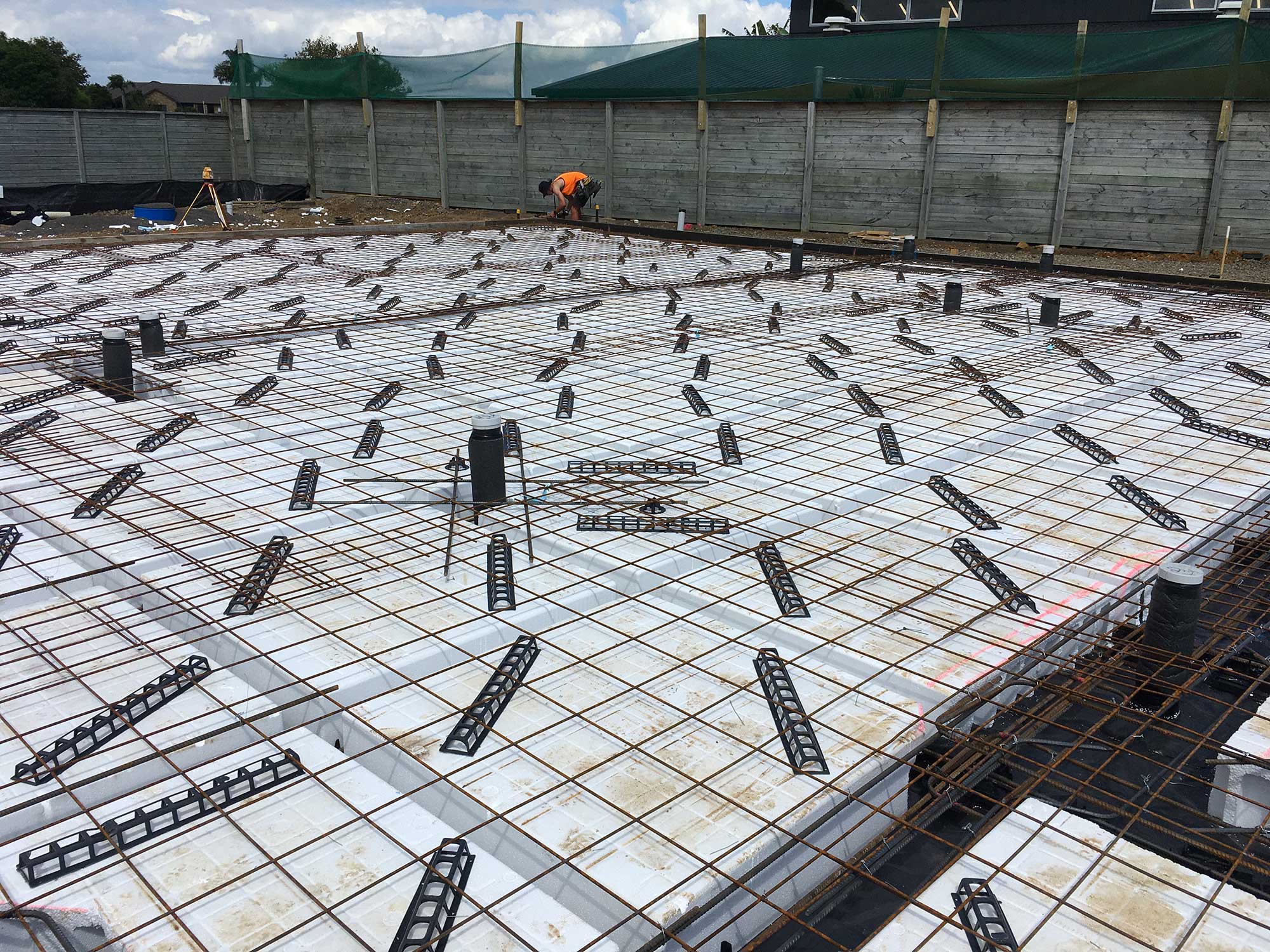 Structural engineer inspecting large foundations for structural design in Pukekohe, Auckland